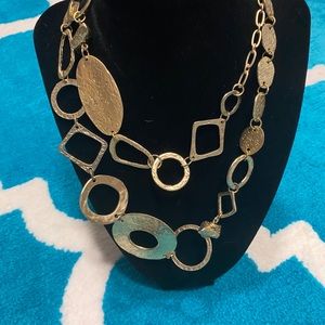 Long gold statement necklace